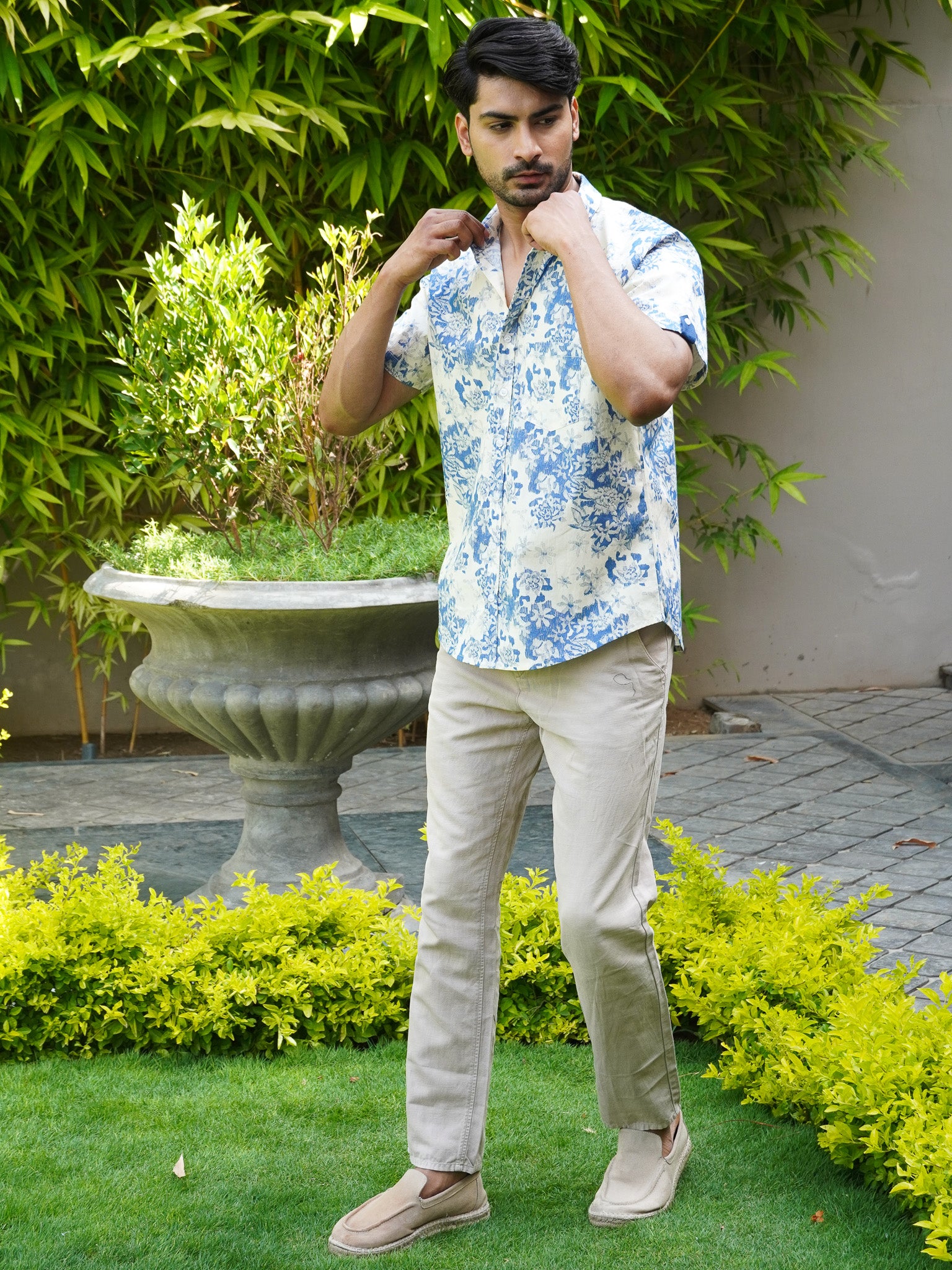 Side view of white blue botanical printed half sleeve shirt for men
