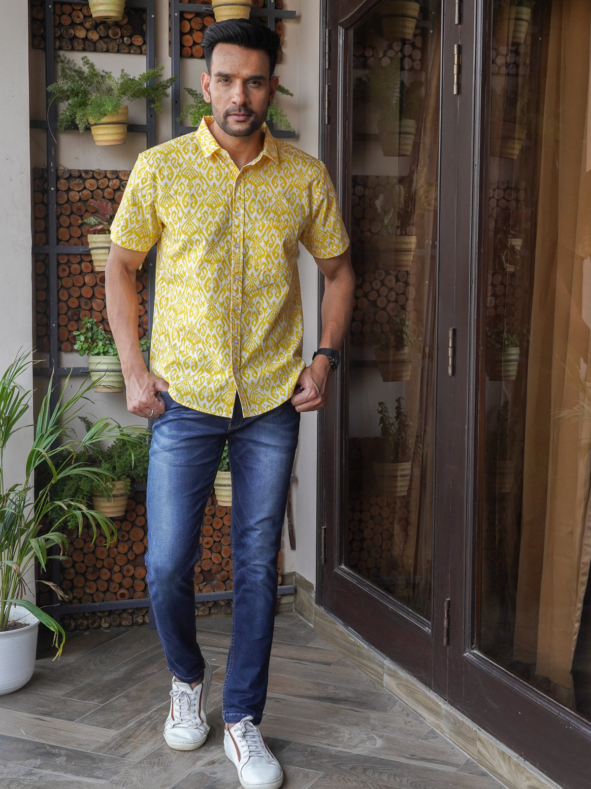 Front view of men’s yellow geometric printed cotton shirt